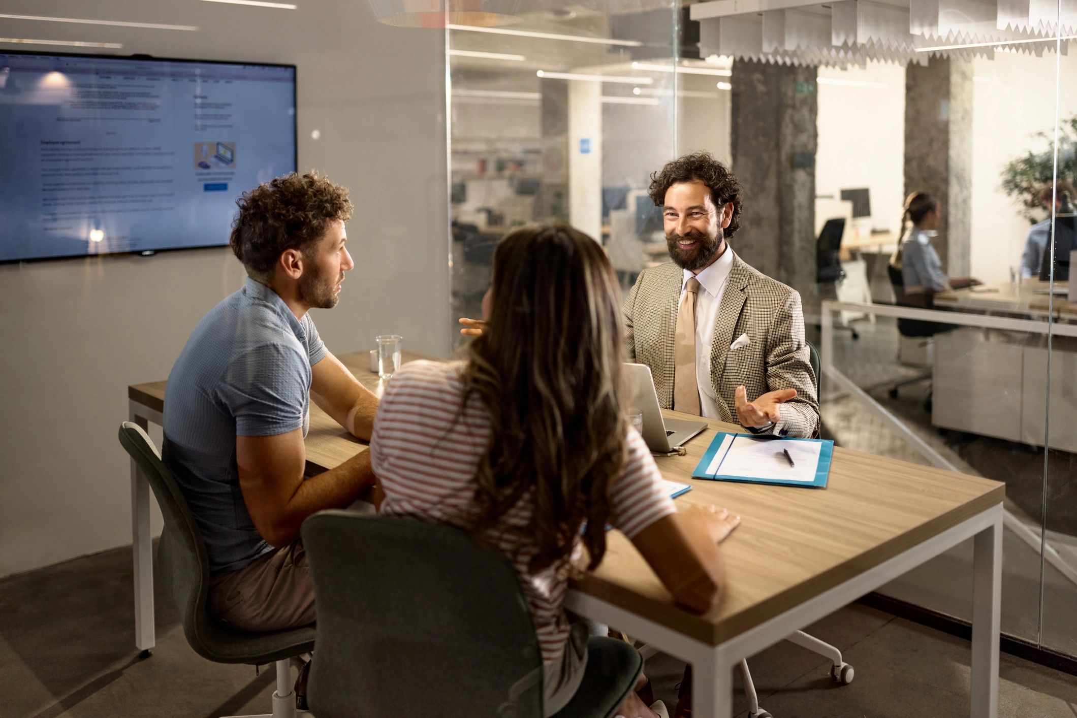 Professional consultant meeting with clients in an office